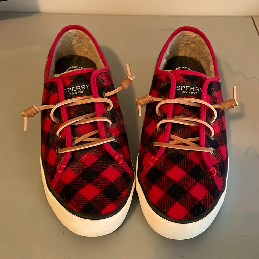 Red and black slip on Sperry’s.